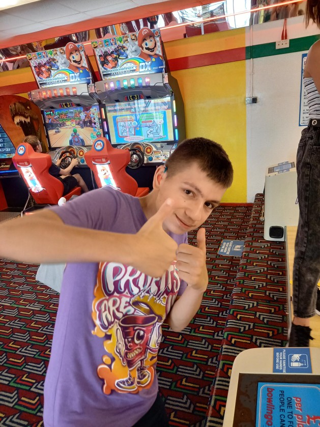 Kai enjoying the arcade