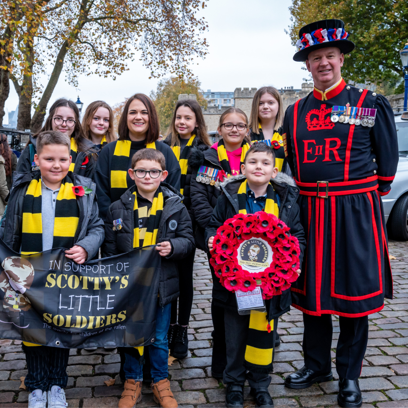 Bereaved British Forces children & young people at Remembrance Parade in London with Scotty's Little Soldiers