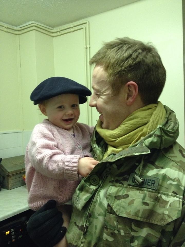 Ian holding his daughter, Gracie