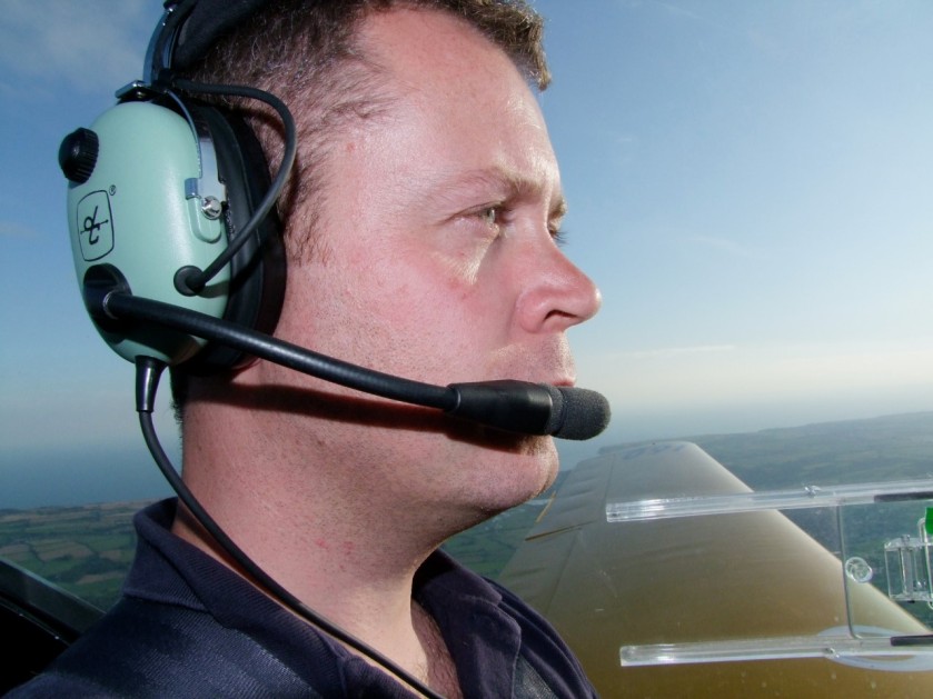 Michael piloting an aircraft