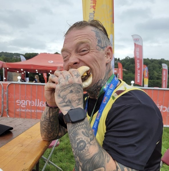 Gav enjoying a post-race burger